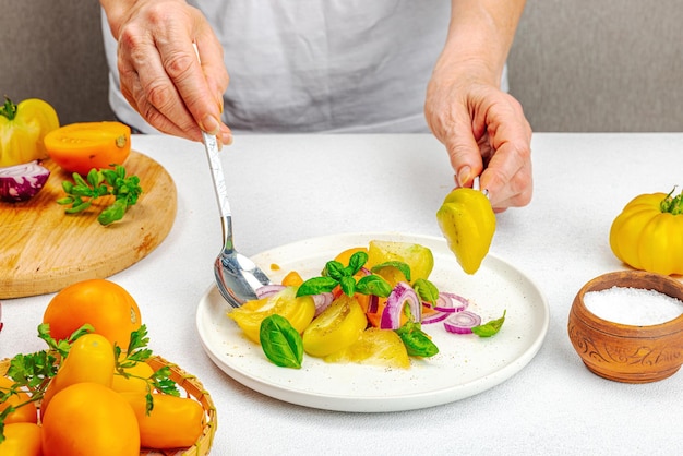 Chef preparing a fresh dish in a bright kitchen
